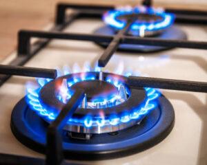 Closeup shots of blue flames in a domestic kitchen