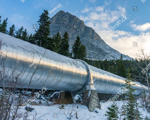 Big pipeline in Grassi Lakes hiking trail connects Whitemans Pond and Rundle Forebay.
